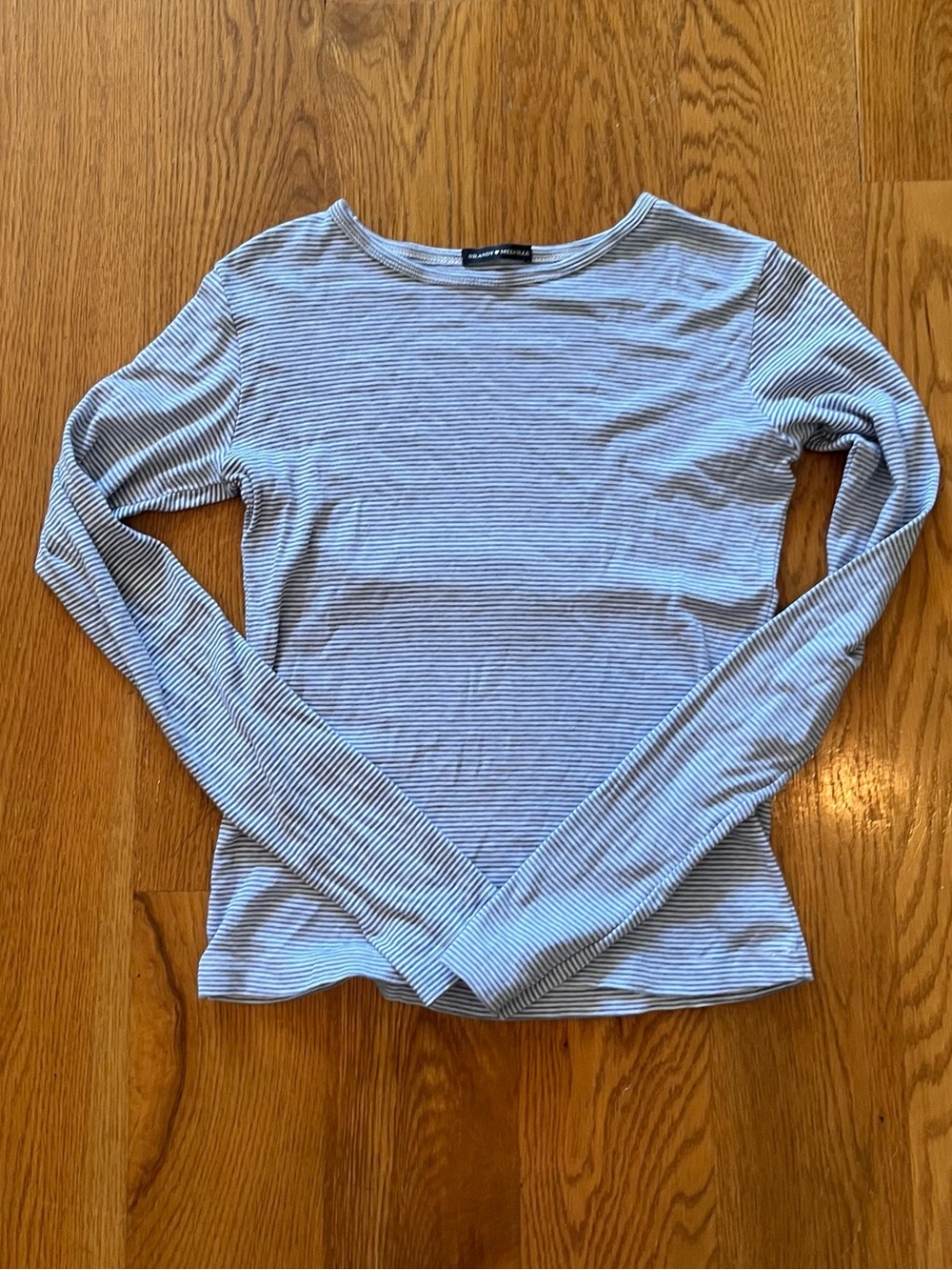 Brand Melville a new day Light Blue & White Striped Long-Sleeve Crewneck Top